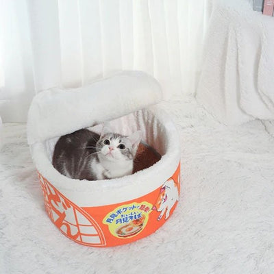 Un chat dans sa maison pour chaton original en forme de bol de nouille
